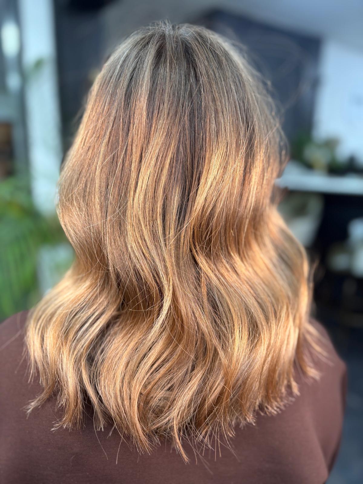 Hairstyle by Unit G